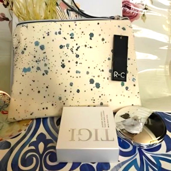 "Elevate Your Beauty: Ruby+Cash Makeup Pouch & TIGI Powder Foundation Duo" 💄✨ - Picture 1 of 10